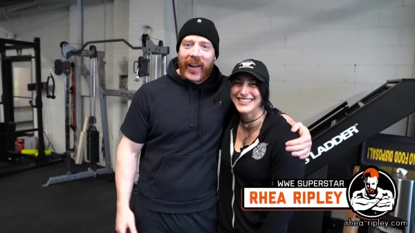 Rhea_Ripley_flexes_on_Sheamus_with_her__Nightmare__Arms_workout_0134.jpg