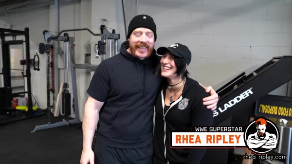 Rhea_Ripley_flexes_on_Sheamus_with_her__Nightmare__Arms_workout_0136.jpg