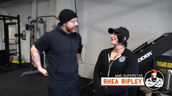 Rhea_Ripley_flexes_on_Sheamus_with_her__Nightmare__Arms_workout_0147.jpg