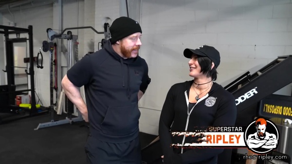 Rhea_Ripley_flexes_on_Sheamus_with_her__Nightmare__Arms_workout_0148.jpg