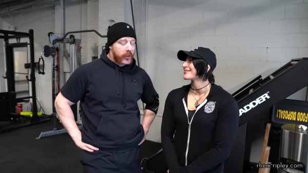 Rhea_Ripley_flexes_on_Sheamus_with_her__Nightmare__Arms_workout_0178.jpg