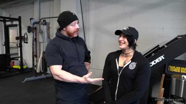 Rhea_Ripley_flexes_on_Sheamus_with_her__Nightmare__Arms_workout_0189.jpg