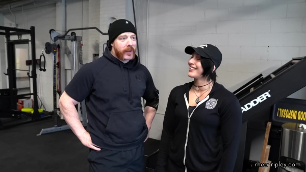 Rhea_Ripley_flexes_on_Sheamus_with_her__Nightmare__Arms_workout_0207.jpg