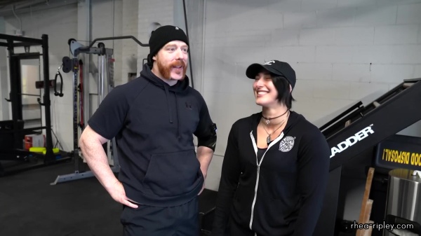 Rhea_Ripley_flexes_on_Sheamus_with_her__Nightmare__Arms_workout_0212.jpg
