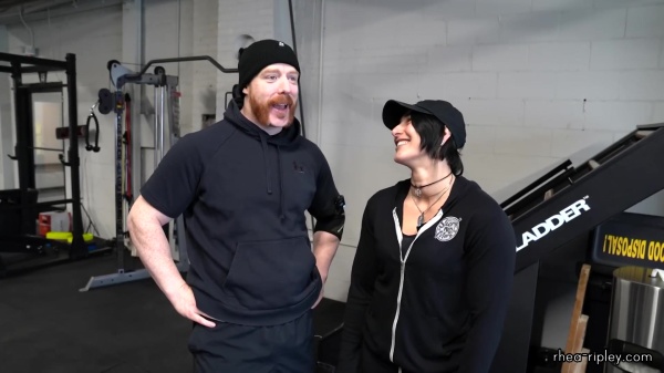 Rhea_Ripley_flexes_on_Sheamus_with_her__Nightmare__Arms_workout_0213.jpg