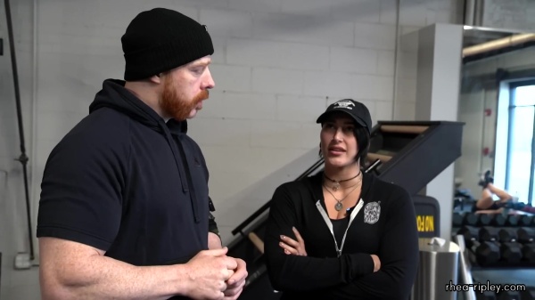 Rhea_Ripley_flexes_on_Sheamus_with_her__Nightmare__Arms_workout_0389.jpg