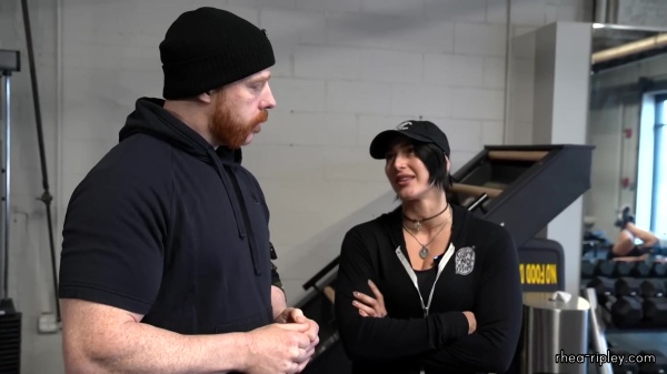 Rhea_Ripley_flexes_on_Sheamus_with_her__Nightmare__Arms_workout_0400.jpg