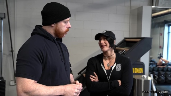 Rhea_Ripley_flexes_on_Sheamus_with_her__Nightmare__Arms_workout_0401.jpg