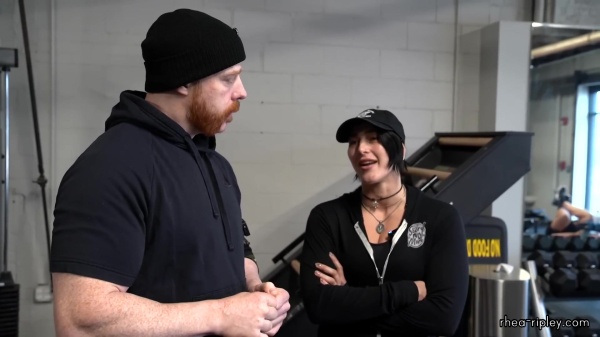 Rhea_Ripley_flexes_on_Sheamus_with_her__Nightmare__Arms_workout_0403.jpg