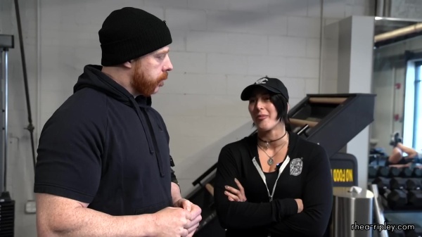 Rhea_Ripley_flexes_on_Sheamus_with_her__Nightmare__Arms_workout_0404.jpg