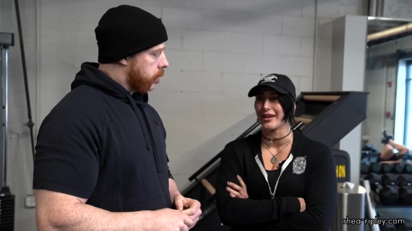 Rhea_Ripley_flexes_on_Sheamus_with_her__Nightmare__Arms_workout_0409.jpg