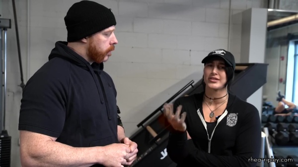 Rhea_Ripley_flexes_on_Sheamus_with_her__Nightmare__Arms_workout_0422.jpg