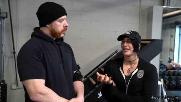 Rhea_Ripley_flexes_on_Sheamus_with_her__Nightmare__Arms_workout_0429.jpg