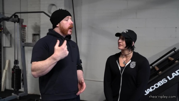 Rhea_Ripley_flexes_on_Sheamus_with_her__Nightmare__Arms_workout_0526.jpg