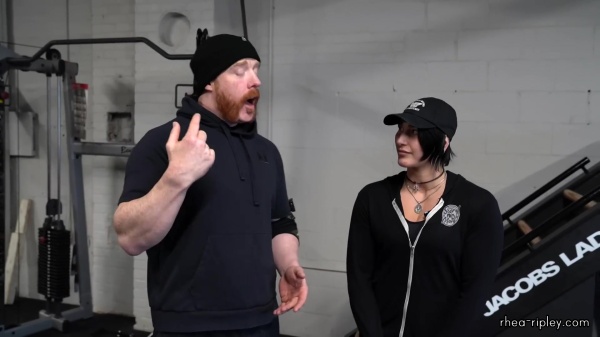 Rhea_Ripley_flexes_on_Sheamus_with_her__Nightmare__Arms_workout_0527.jpg