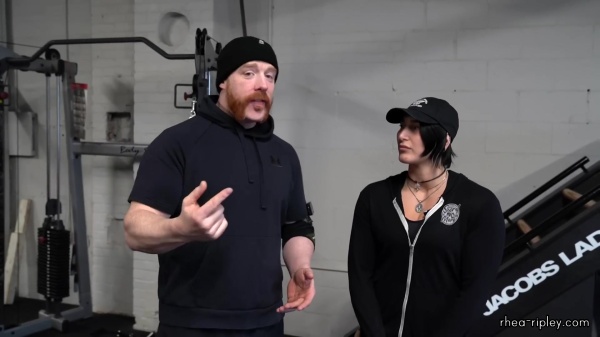 Rhea_Ripley_flexes_on_Sheamus_with_her__Nightmare__Arms_workout_0528.jpg