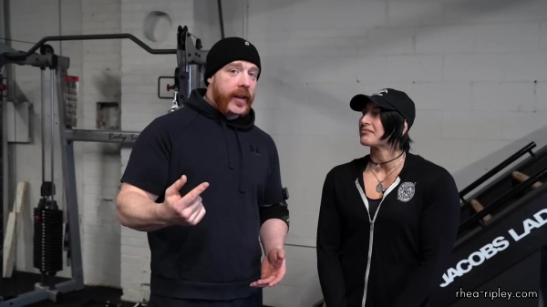 Rhea_Ripley_flexes_on_Sheamus_with_her__Nightmare__Arms_workout_0529.jpg