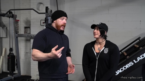 Rhea_Ripley_flexes_on_Sheamus_with_her__Nightmare__Arms_workout_0531.jpg