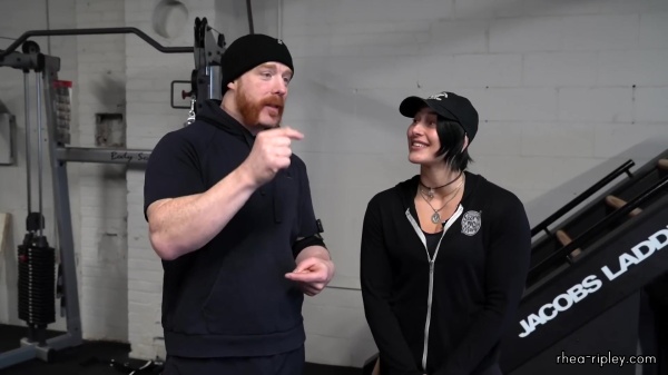 Rhea_Ripley_flexes_on_Sheamus_with_her__Nightmare__Arms_workout_0553.jpg