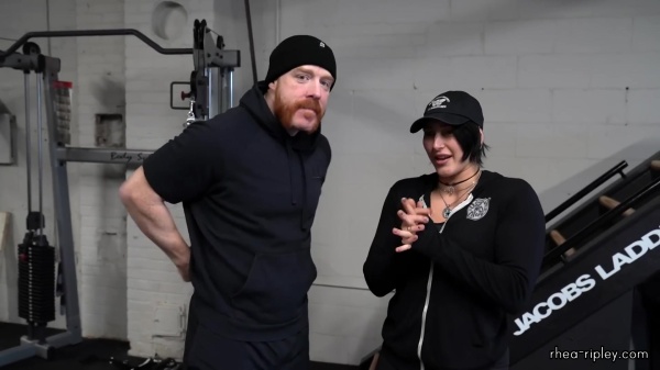 Rhea_Ripley_flexes_on_Sheamus_with_her__Nightmare__Arms_workout_0571.jpg