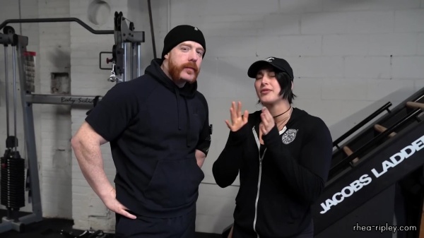 Rhea_Ripley_flexes_on_Sheamus_with_her__Nightmare__Arms_workout_0578.jpg