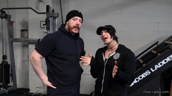 Rhea_Ripley_flexes_on_Sheamus_with_her__Nightmare__Arms_workout_0579.jpg