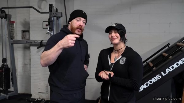 Rhea_Ripley_flexes_on_Sheamus_with_her__Nightmare__Arms_workout_0594.jpg