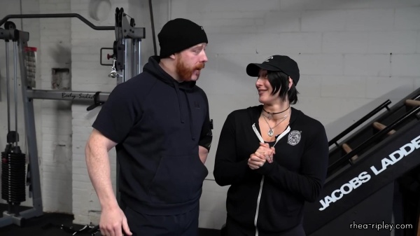Rhea_Ripley_flexes_on_Sheamus_with_her__Nightmare__Arms_workout_0612.jpg