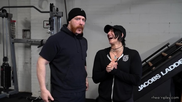 Rhea_Ripley_flexes_on_Sheamus_with_her__Nightmare__Arms_workout_0615.jpg