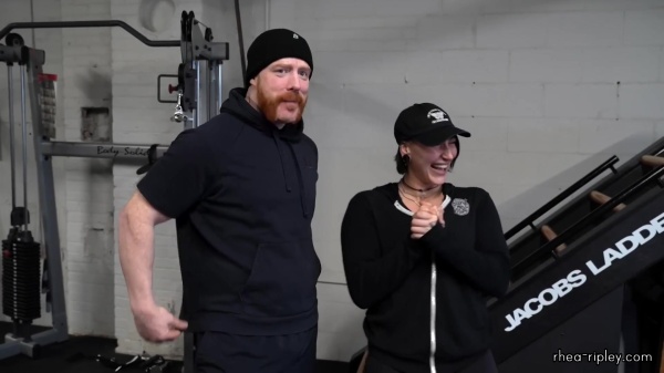 Rhea_Ripley_flexes_on_Sheamus_with_her__Nightmare__Arms_workout_0617.jpg