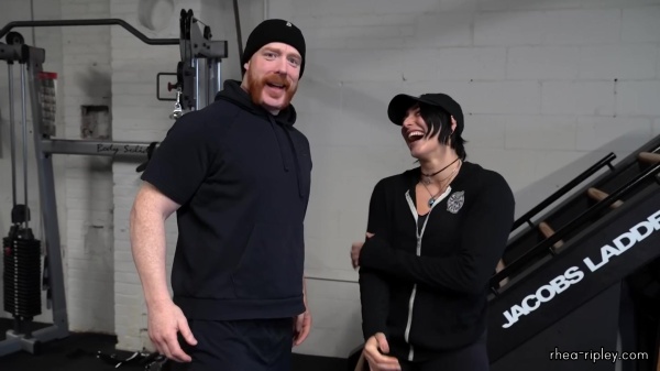 Rhea_Ripley_flexes_on_Sheamus_with_her__Nightmare__Arms_workout_0621.jpg