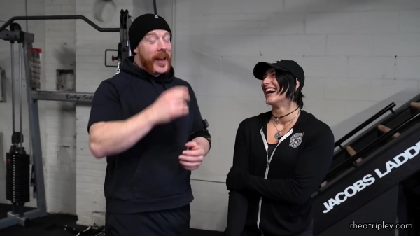 Rhea_Ripley_flexes_on_Sheamus_with_her__Nightmare__Arms_workout_0629.jpg