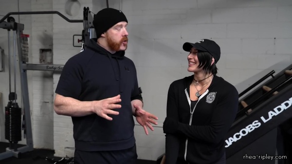 Rhea_Ripley_flexes_on_Sheamus_with_her__Nightmare__Arms_workout_0647.jpg