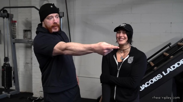Rhea_Ripley_flexes_on_Sheamus_with_her__Nightmare__Arms_workout_0664.jpg
