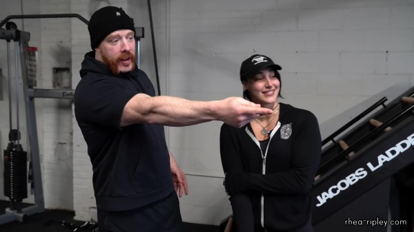 Rhea_Ripley_flexes_on_Sheamus_with_her__Nightmare__Arms_workout_0665.jpg