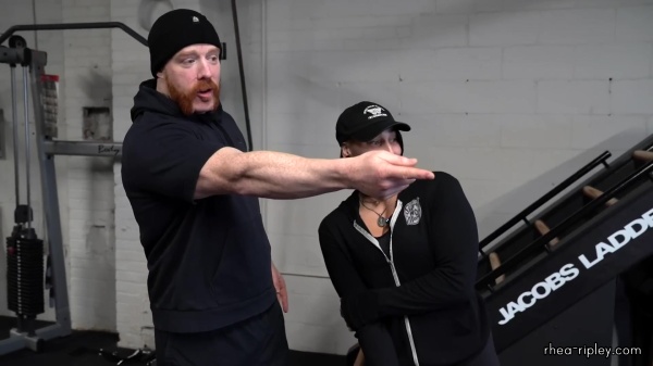 Rhea_Ripley_flexes_on_Sheamus_with_her__Nightmare__Arms_workout_0667.jpg