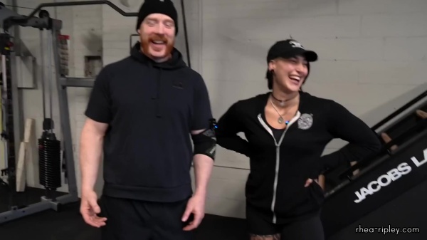 Rhea_Ripley_flexes_on_Sheamus_with_her__Nightmare__Arms_workout_0703.jpg