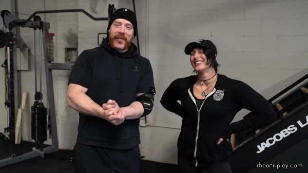 Rhea_Ripley_flexes_on_Sheamus_with_her__Nightmare__Arms_workout_0707.jpg