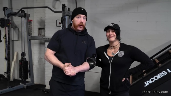 Rhea_Ripley_flexes_on_Sheamus_with_her__Nightmare__Arms_workout_0722.jpg