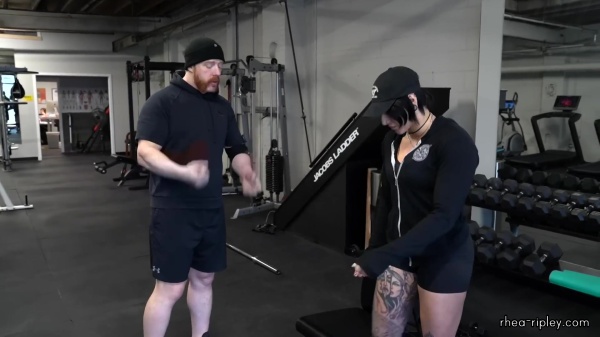 Rhea_Ripley_flexes_on_Sheamus_with_her__Nightmare__Arms_workout_0743.jpg