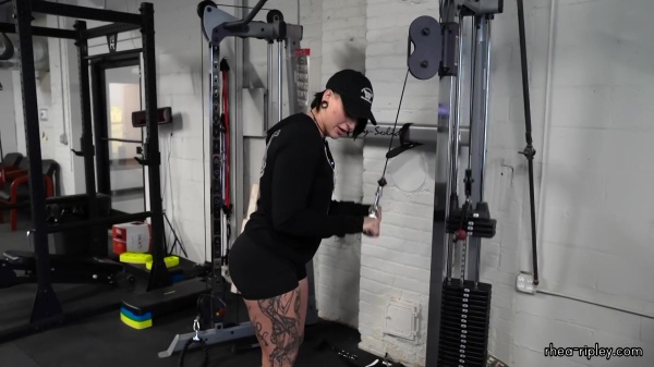 Rhea_Ripley_flexes_on_Sheamus_with_her__Nightmare__Arms_workout_0807.jpg