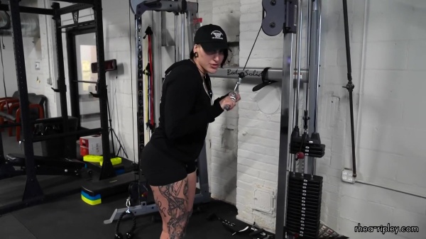 Rhea_Ripley_flexes_on_Sheamus_with_her__Nightmare__Arms_workout_0815.jpg