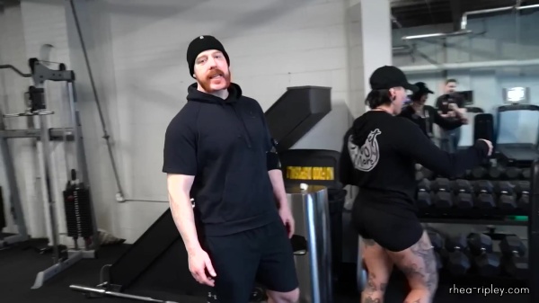 Rhea_Ripley_flexes_on_Sheamus_with_her__Nightmare__Arms_workout_0875.jpg