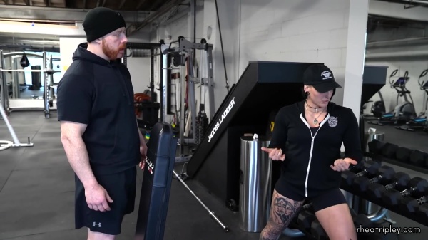 Rhea_Ripley_flexes_on_Sheamus_with_her__Nightmare__Arms_workout_0897.jpg