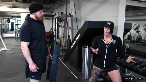 Rhea_Ripley_flexes_on_Sheamus_with_her__Nightmare__Arms_workout_0900.jpg