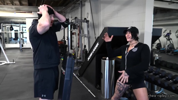 Rhea_Ripley_flexes_on_Sheamus_with_her__Nightmare__Arms_workout_0931.jpg