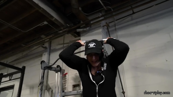 Rhea_Ripley_flexes_on_Sheamus_with_her__Nightmare__Arms_workout_1975.jpg