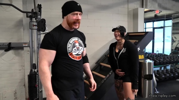 Rhea_Ripley_flexes_on_Sheamus_with_her__Nightmare__Arms_workout_2340.jpg