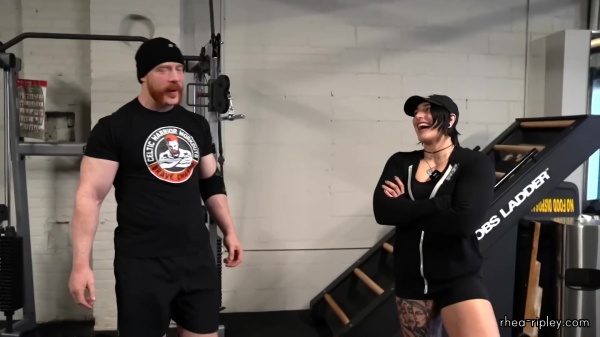Rhea_Ripley_flexes_on_Sheamus_with_her__Nightmare__Arms_workout_2350.jpg