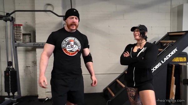 Rhea_Ripley_flexes_on_Sheamus_with_her__Nightmare__Arms_workout_2355.jpg